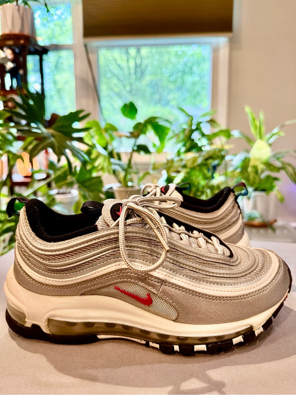 Nike Women’s Air Max 97 Sneakers in Metallic Silver